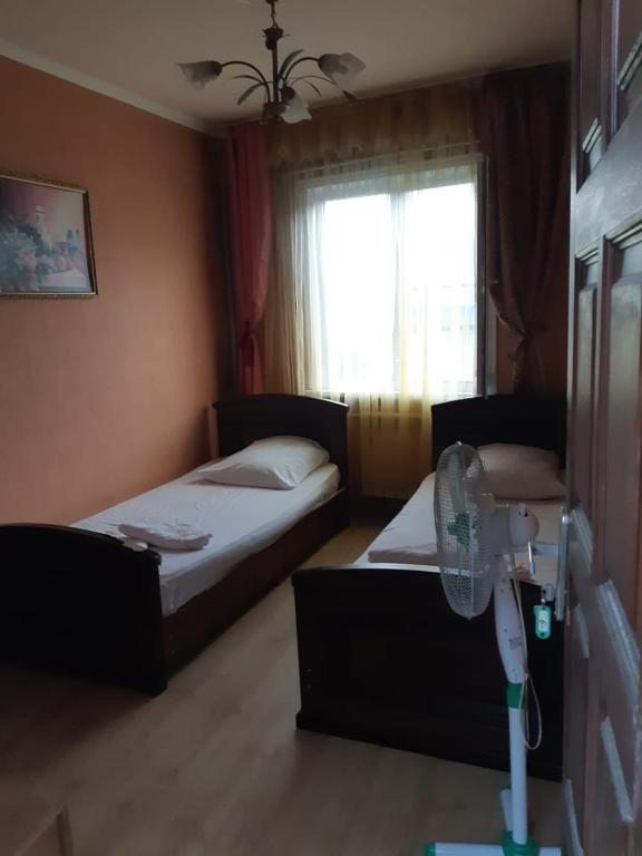 Двухместный (Двухместный номер с 2 отдельными кроватями и общей ванной комнатой), Гостевой дом Аида на Фермерском