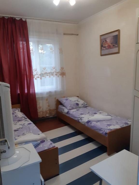 Двухместный (Двухместный номер с 2 отдельными кроватями и общей ванной комнатой), Гостевой дом Аида на Фермерском