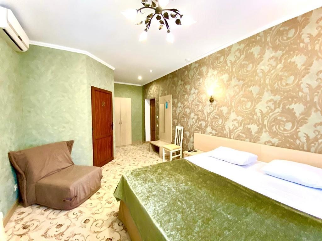 Двухместный (Большой двухместный номер с 1 кроватью) отеля Олимпия на Островского, Сочи