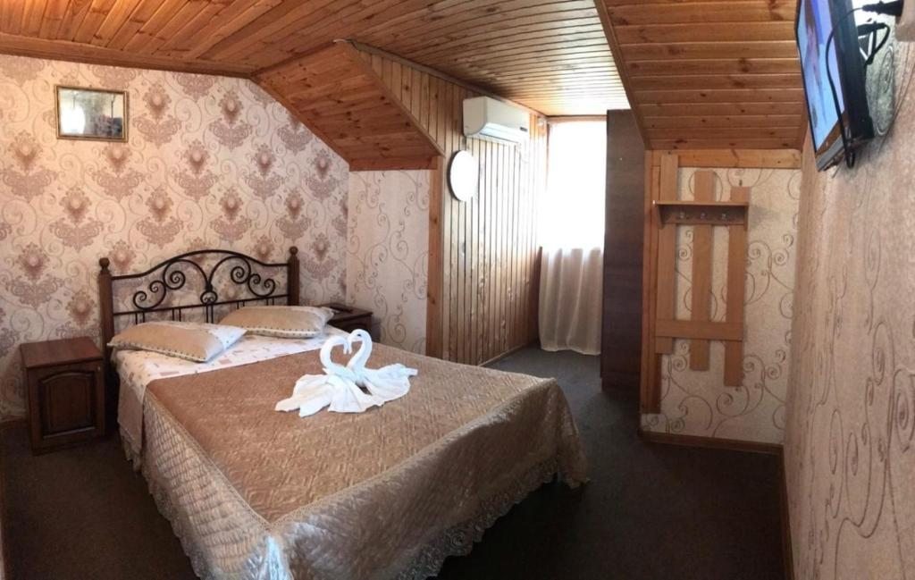 Двухместный (Двухместный номер с 1 кроватью или 2 отдельными кроватями, общая ванная комната) гостевого дома 7 Небо, Лоо