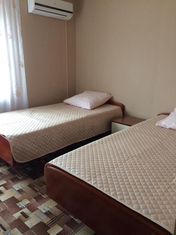 Двухместный (Двухместный номер с 2 отдельными кроватями и душем) гостевого дома Амигос, Анапа