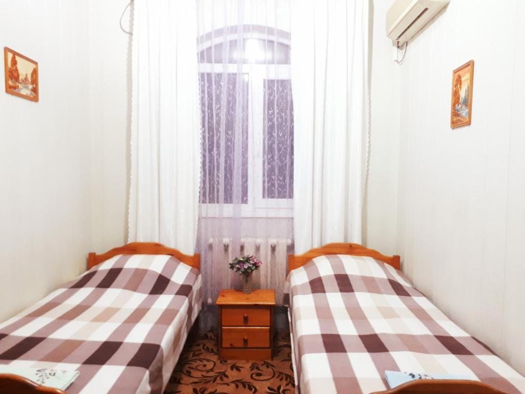 Двухместный (Двухместный номер с 2 отдельными кроватями и собственной ванной комнатой) гостевого дома На Крымской, Анапа