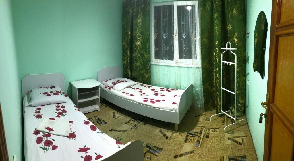Двухместный (Двухместный номер с 2 отдельными кроватями) гостевого дома Амелия, Лоо