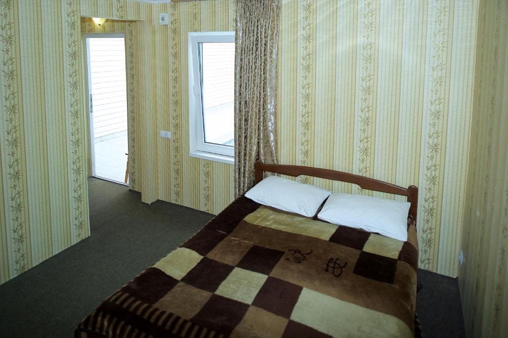 Двухместный (Двухместный номер с 1 кроватью и видом на бассейн) гостевого дома Sea Breeze, Лоо