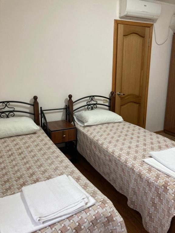 Двухместный (Стандартный двухместный номер с 2 отдельными кроватями) гостевого дома Sea Breeze, Лоо