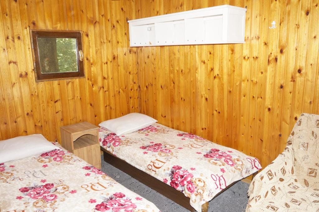 Двухместный (Двухместный номер с 1 кроватью или 2 отдельными кроватями и собственной ванной комнатой) гостевого дома Морской, Лоо