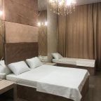 Четырехместный (Улучшенный четырехместный номер), Отель Grand Deluxe