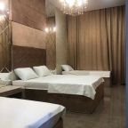 Четырехместный (Улучшенный четырехместный номер), Отель Grand Deluxe