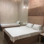Четырехместный (Улучшенный четырехместный номер), Отель Grand Deluxe