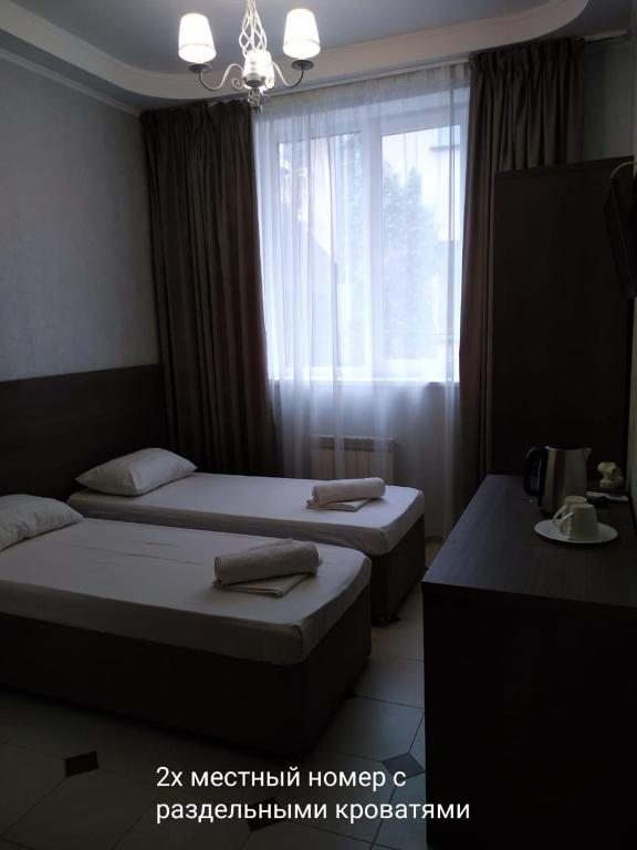 Двухместный (Двухместный номер с 2 отдельными кроватями) отеля Азалия, Лазаревское