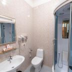 Ванная комната в номере исторического отеля Легендарный отель Советский, Москва