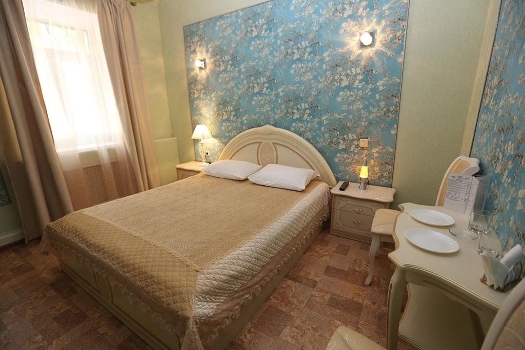Двухместный (Двухместный номер Делюкс с 1 кроватью и душем) отеля Romani, Москва