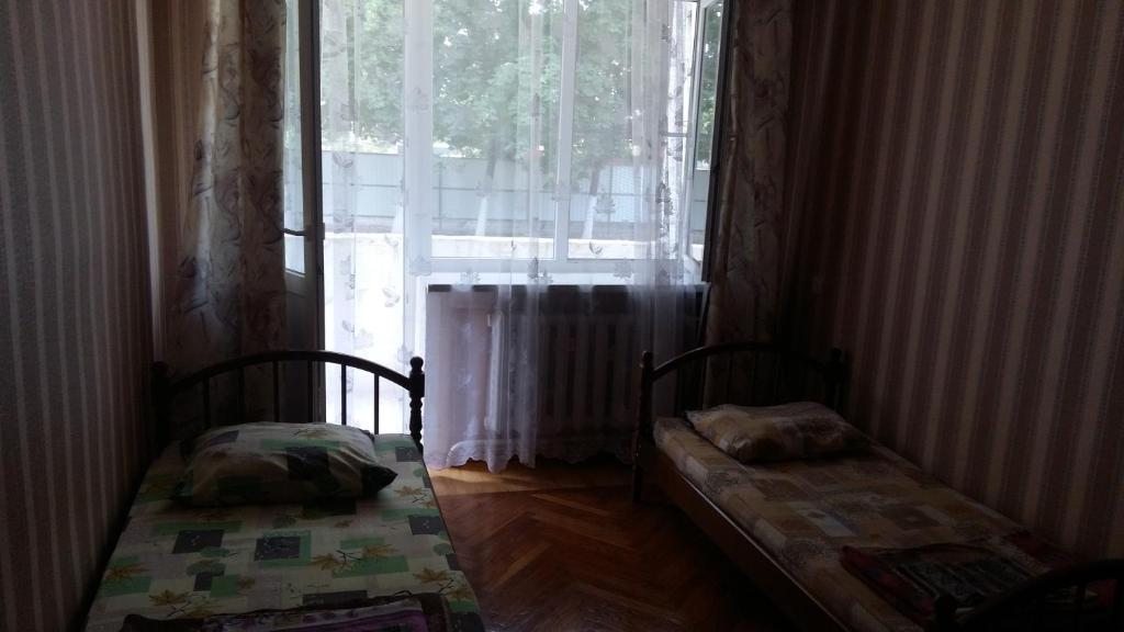 Двухместный (Двухместный номер с 2 отдельными кроватями и ванной комнатой) мини-гостиницы Отель Kolos, Каневская
