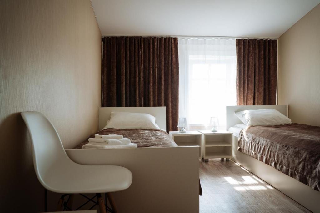 Двухместный (Стандартный двухместный номер с 2 отдельными кроватями) мотеля Вираж, Вологда