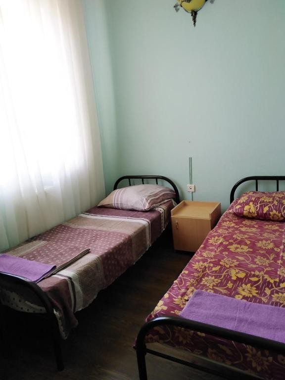 Двухместный (Двухместный номер с 1 кроватью или 2 отдельными кроватями и общей ванной комнатой) гостевого дома Аделия, Анапа