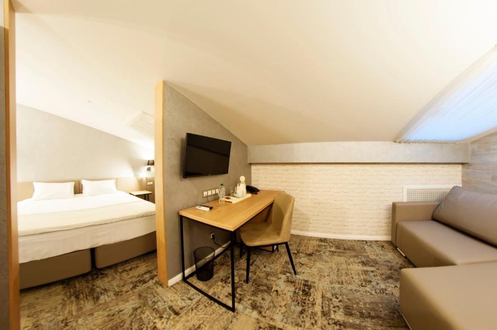 Двухместный (Двухместный номер с 2 отдельными кроватями и душем - Мансардный этаж) отеля Скандинавия, Череповец