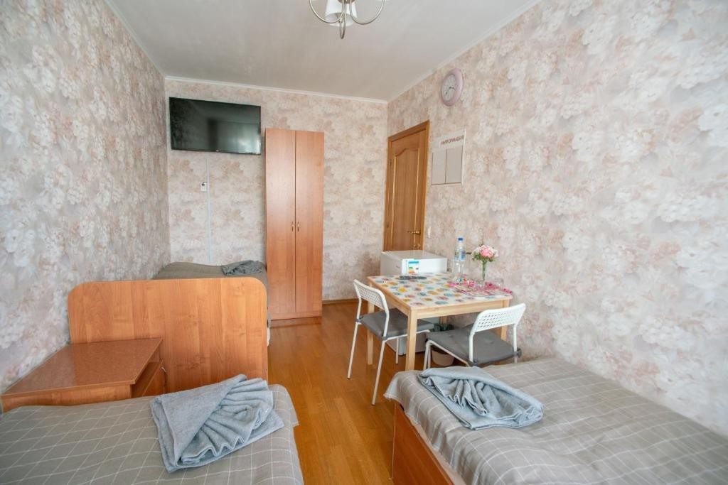 Номер (Односпальная кровать в общем номере для мужчин и женщин), Rooms in Tsilkovskogo 92A