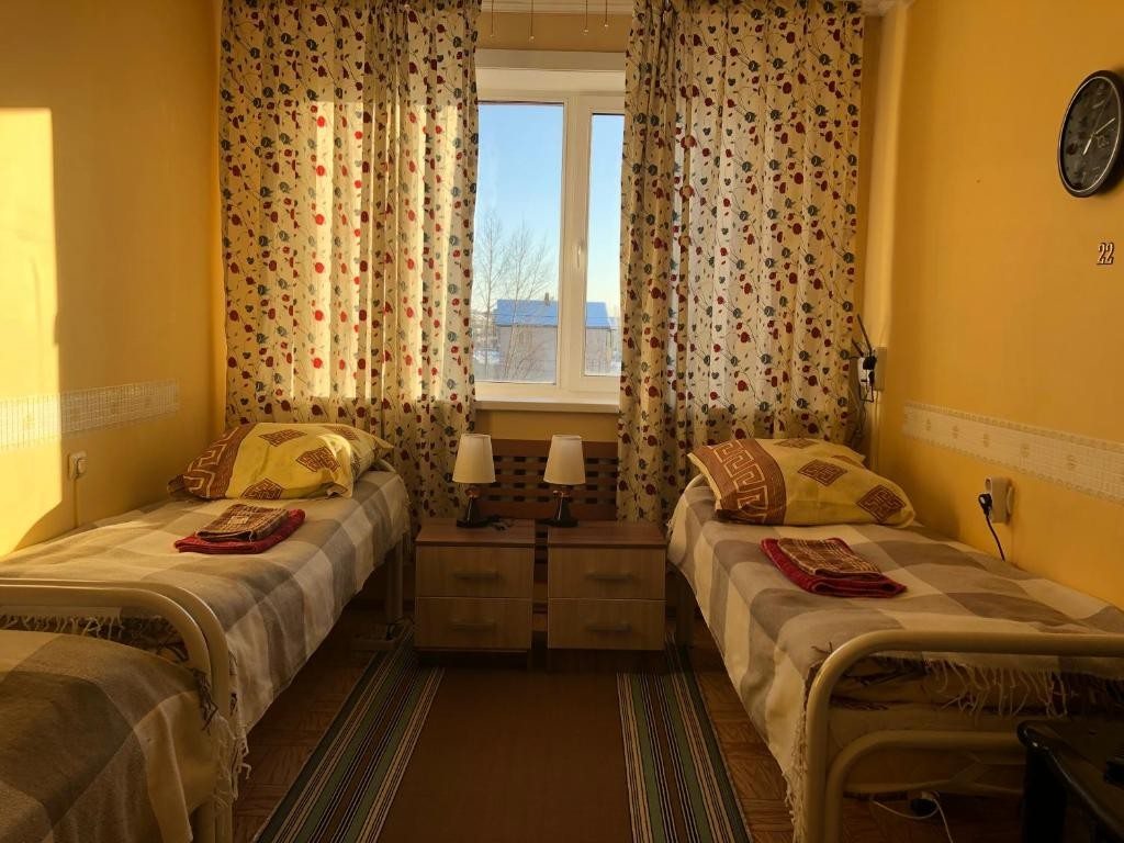 Номер (Односпальная кровать в общем номере для женщин) гостевого дома Комфорт гостевой дом, Южно-Сахалинск