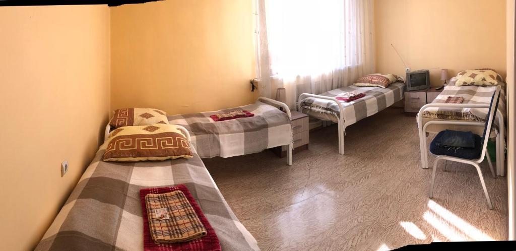 Номер (Кровать в общем 4-местном номере для мужчин и женщин) гостевого дома Комфорт гостевой дом, Южно-Сахалинск