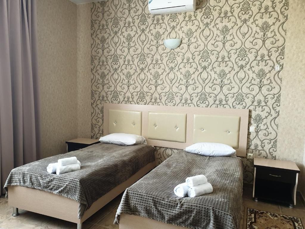 Двухместный (Бюджетный двухместный номер с 2 отдельными кроватями) отеля На Этокской 106в, Ессентуки
