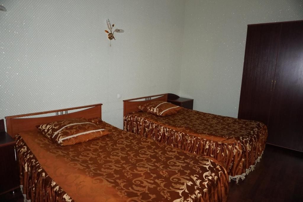 Двухместный (Двухместный номер Делюкс с 2 отдельными кроватями) отеля Зодиак в Радужном, Радужный