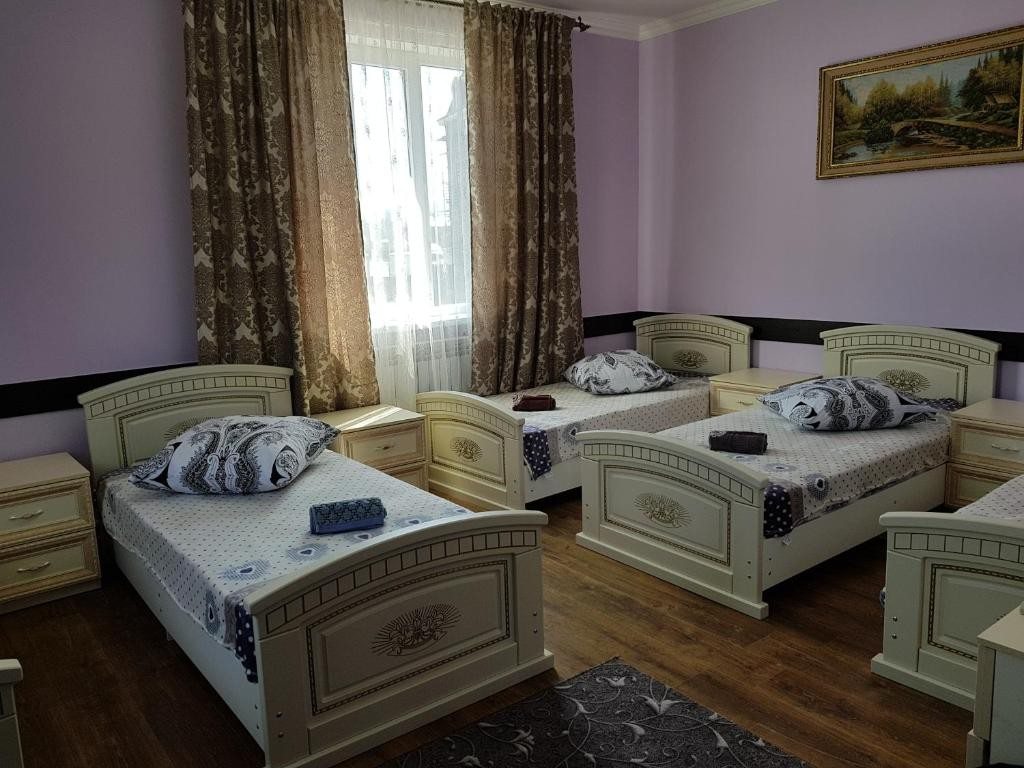 Номер (Односпальная кровать в общем номере) гостевого дома Минутка, Грозный