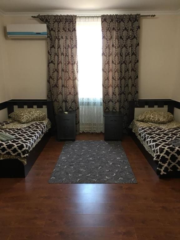 Двухместный (Большой двухместный номер с 2 отдельными кроватями) гостевого дома Минутка, Грозный