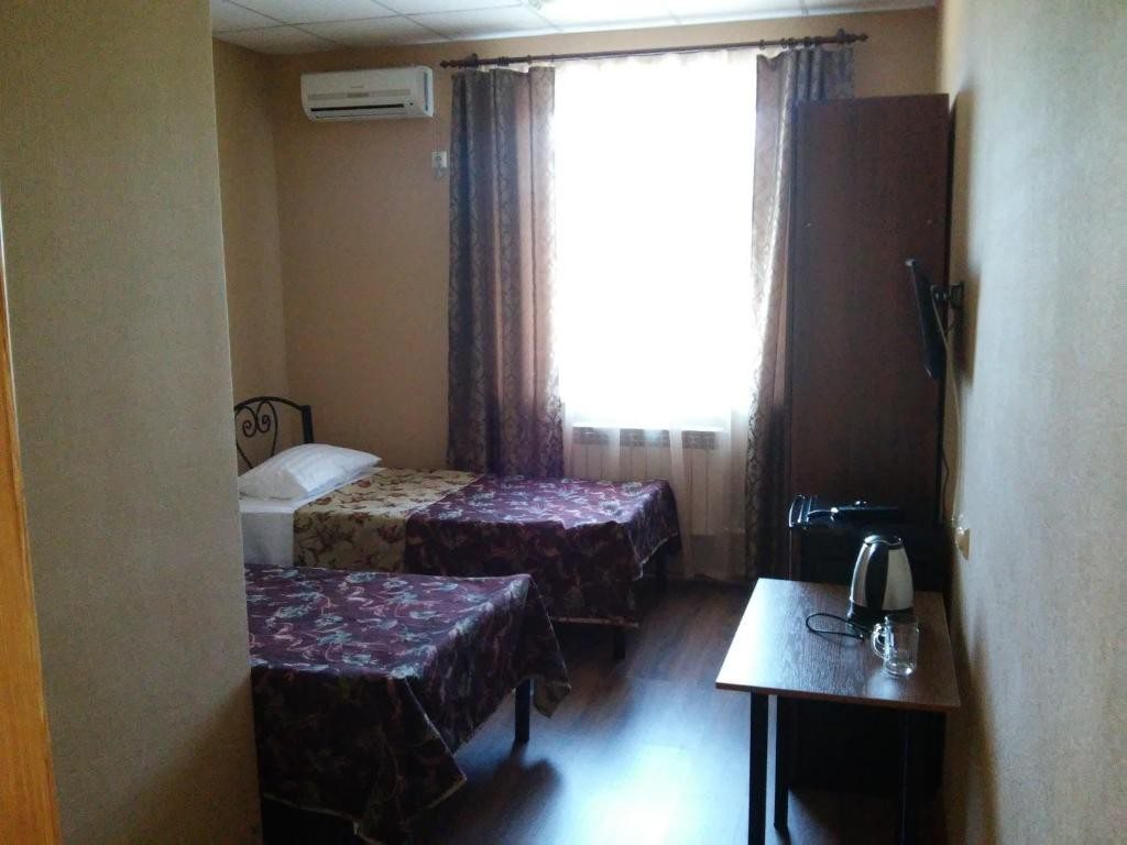 Двухместный (Стандартный двухместный номер с 2 отдельными кроватями) гостиницы На Красной, Кисляковская
