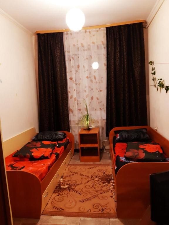 Двухместный (Бюджетный двухместный номер с 2 отдельными кроватями) хостела Таежный дом, Ханты-Мансийск
