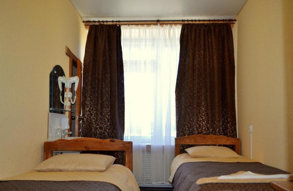 Двухместный (Стандартный двухместный номер с 2 отдельными кроватями) мотеля Привал, Янишполе
