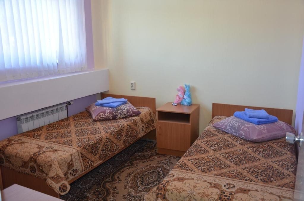 Семейный (Семейный номер с ванной комнатой) отеля Ассоль, Ханты-Мансийск