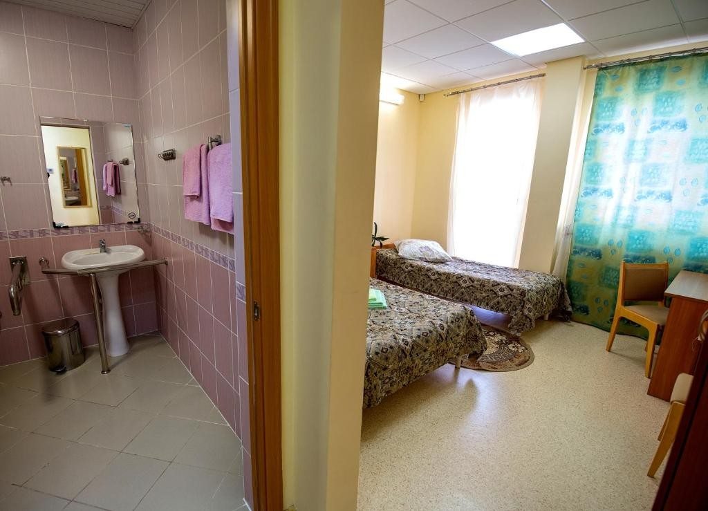 Двухместный (Бюджетный двухместный номер с 2 отдельными кроватями) гостиницы Мустанг, Ханты-Мансийск