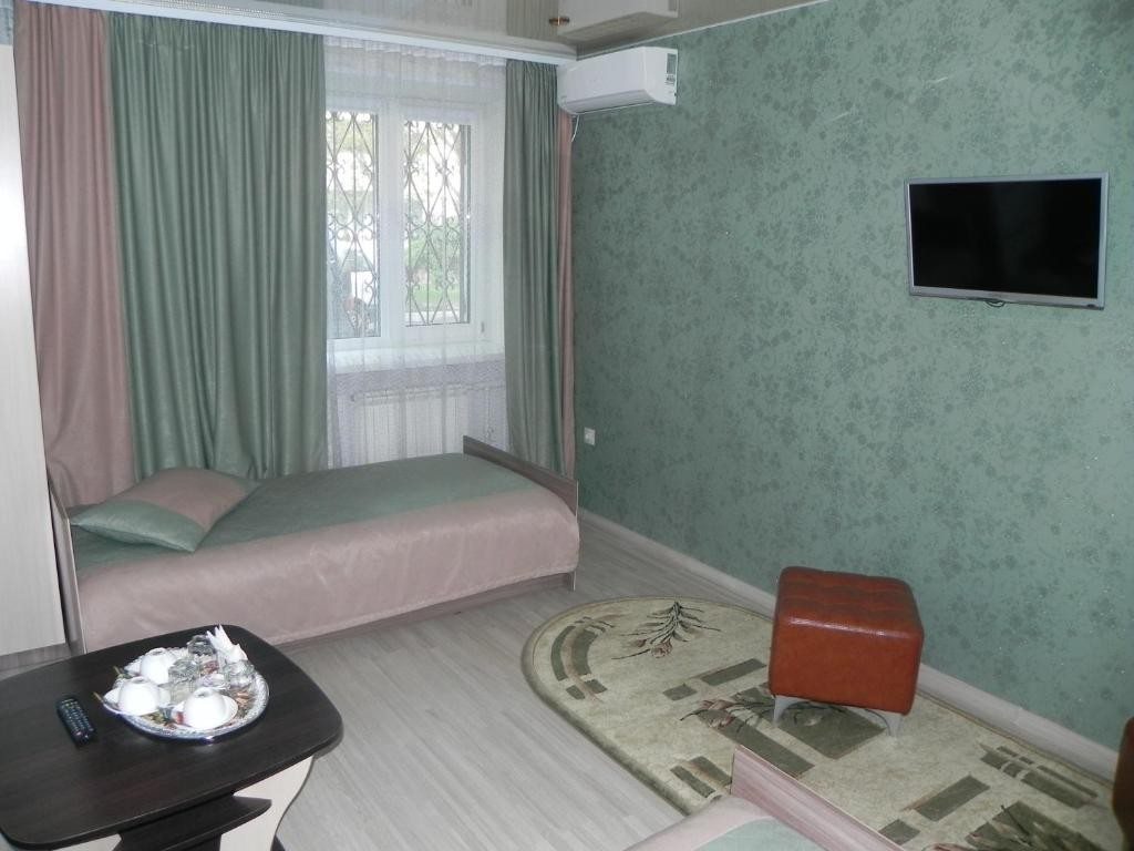 Двухместный (Двухместный номер с 2 отдельными кроватями и ванной комнатой) отеля Миндаль, Уссурийск