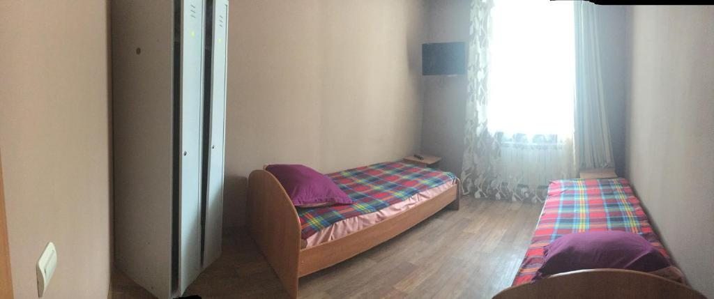 Двухместный (Бюджетный двухместный номер с 2 отдельными кроватями) мотеля Komsomolskiy, Уссурийск