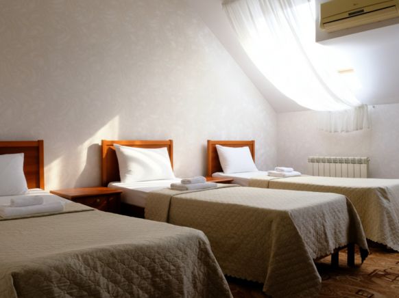 Фотография номера гостиницы Утомленные Солнцем