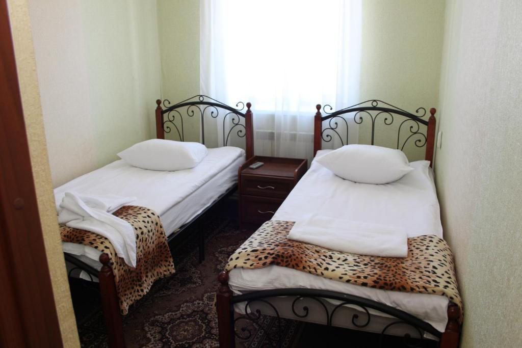 Двухместный (Стандартный двухместный номер с 2 отдельными кроватями) отеля ГРК-Калипсо, Кстово