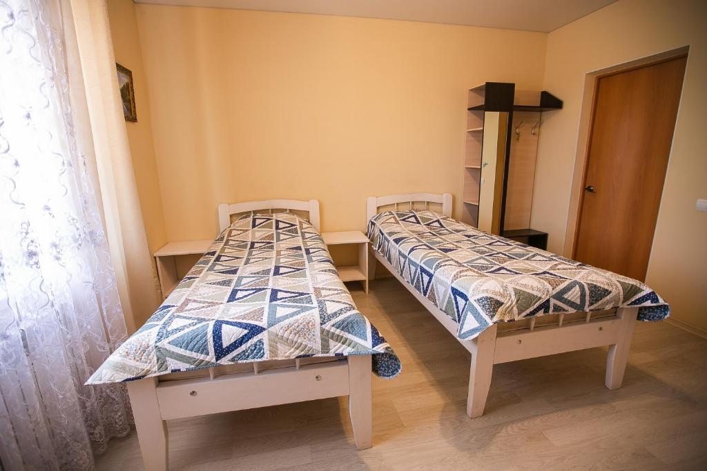 Двухместный (Бюджетный двухместный номер с 2 отдельными кроватями) мини-отеля Релакс, Кунгур