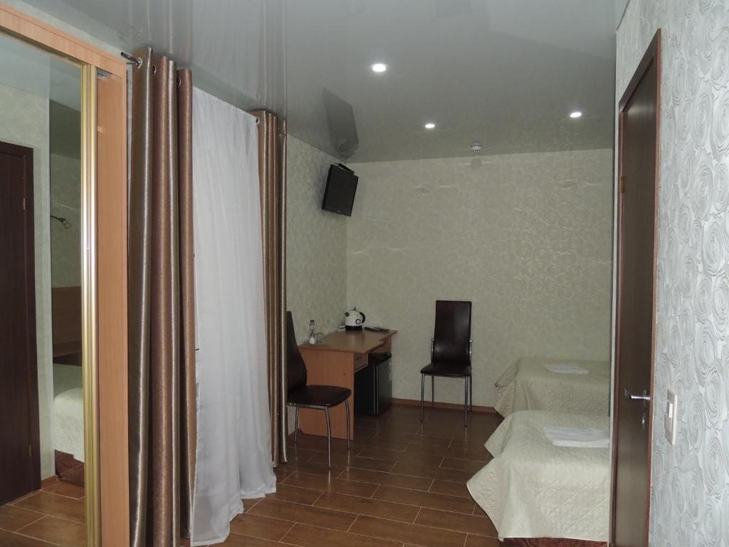 Двухместный (Двухместный номер с 1 кроватью или 2 отдельными кроватями) отеля DragonFlay, Ухта