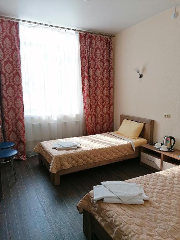 Двухместный (Бюджетный двухместный номер с 2 отдельными кроватями) гостевого дома Енисей, Лесосибирск