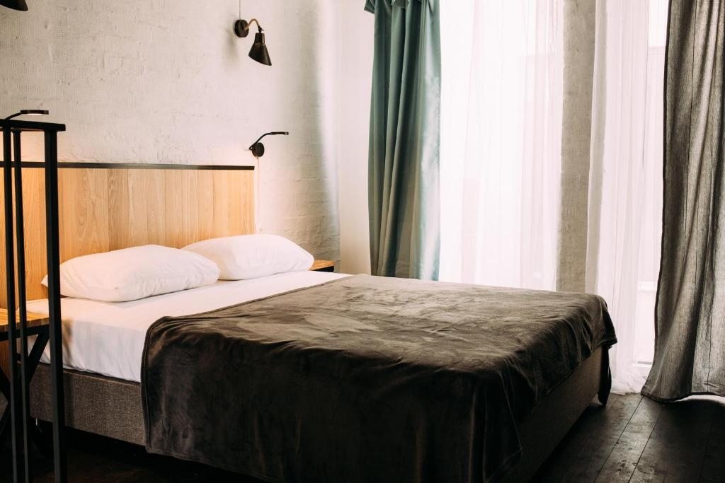 Двухместный (Улучшенный  стандарт с 1 кроватью или 2 отдельными кроватями) отеля Кокон, Тольятти