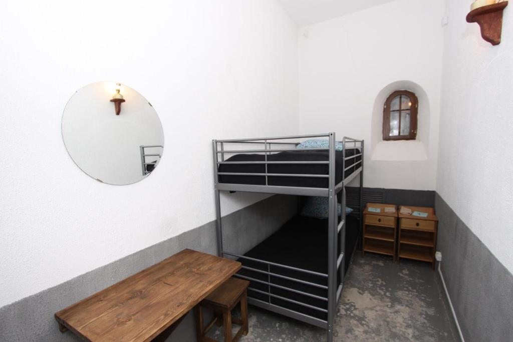 Номер (Спальное место на двухъярусной кровати в общем номере для мужчин и женщин) хостела Hostel Uznik, Тобольск
