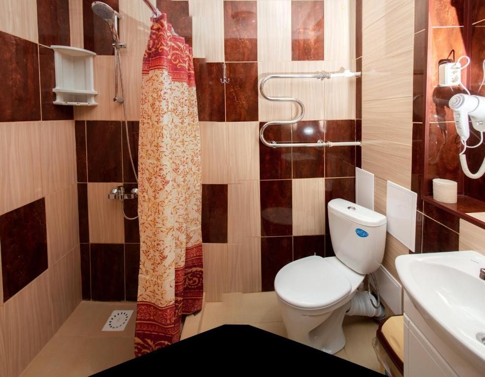 Двухместный (Двухместный номер с 2 отдельными кроватями и собственной ванной комнатой) гостевого дома Усадьба, Советский