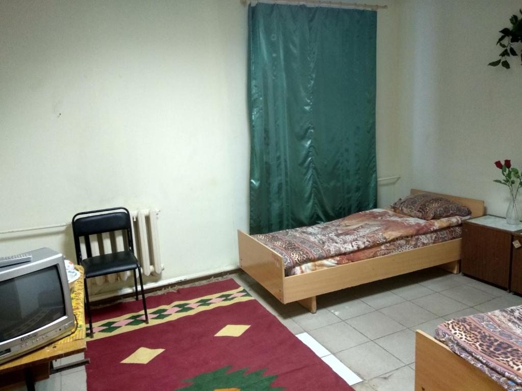 Двухместный (Бюджетный двухместный номер с 2 отдельными кроватями) хостела Мужской хостел Орхидея, Пермь