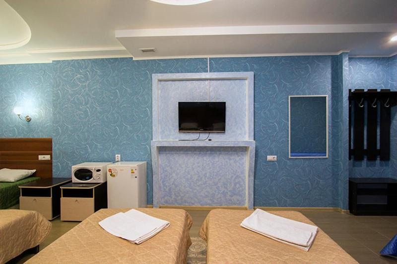Семейный (Cемейный номер с собственной ванной комнатой) мини-отеля Флайт, Пермь