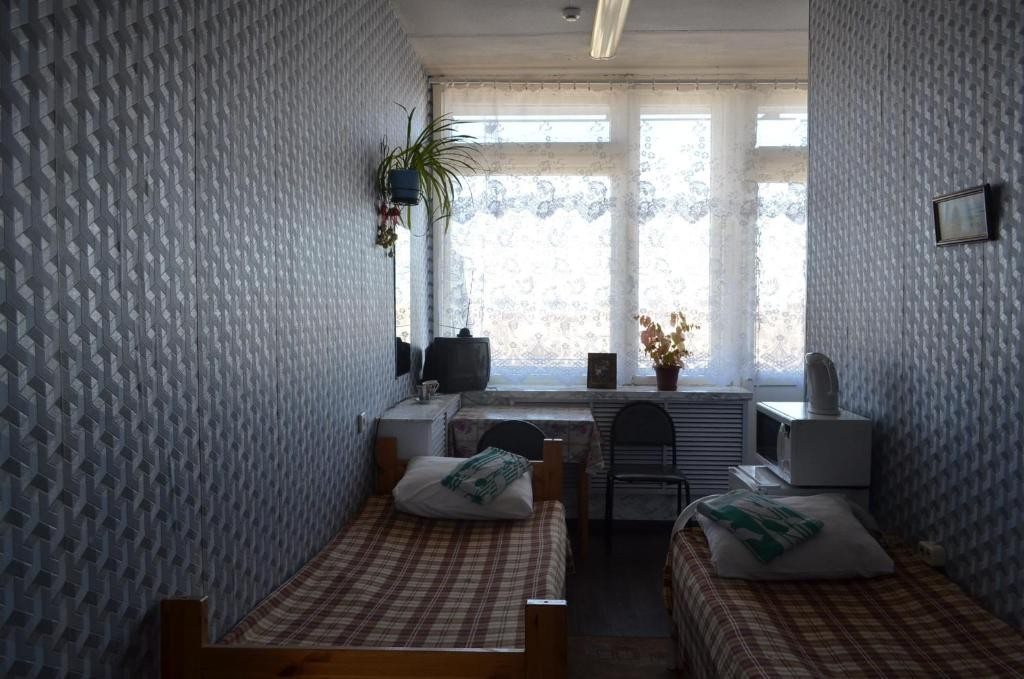 Номер (Односпальная кровать в общем номере с 2 кроватями) хостела Платинум, Петрозаводск