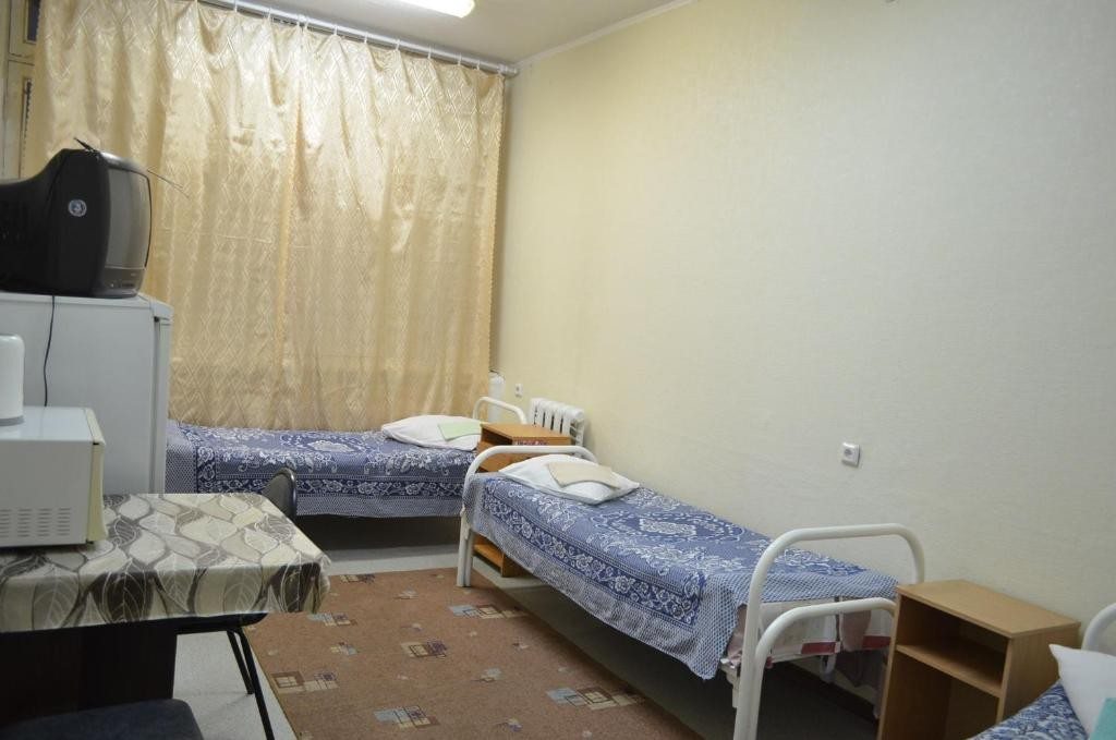 Номер (Односпальная кровать в общем номере с 3 кроватями) хостела Платинум, Петрозаводск