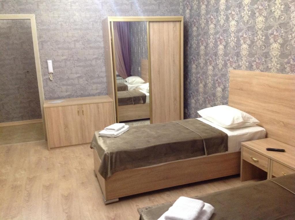 Двухместный (Большой двухместный номер с 1 кроватью или 2 отдельными кроватями) отеля Садко, Махачкала