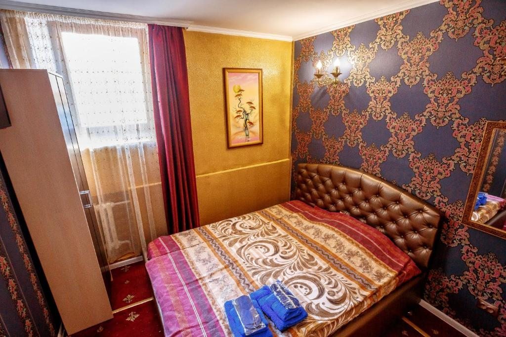 Двухместный (Стандартный двухместный номер с 1 кроватью) мини-отеля Tsarskoe, Владикавказ