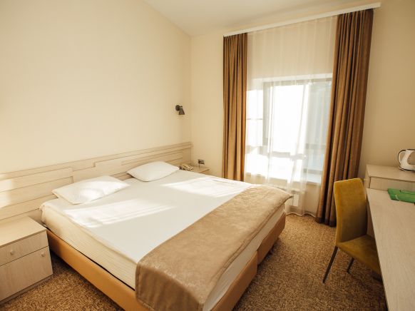 Фотография номера гостиницы Экопарк Поляны