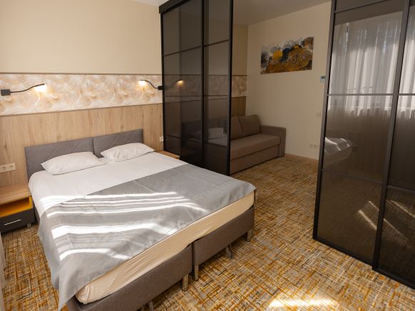 Фотография номера гостиницы Экопарк Поляны